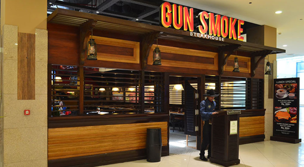 Entrance of Gun Smoke steakhouse in Dolmen Mall Karachi