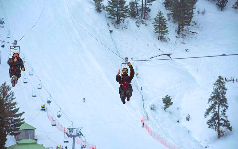 Tourist enjoying zipline at Malam Jabba Ski Resort