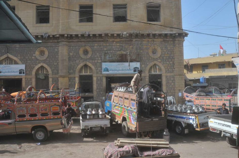 Trucks and pickups parked at Lee Market