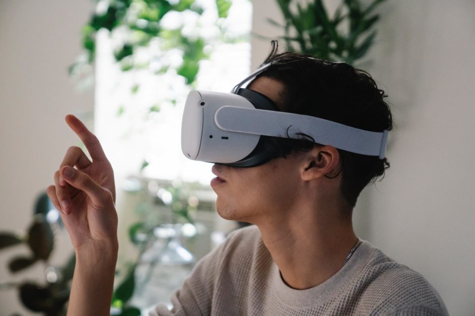 A boy wearing VR glasses