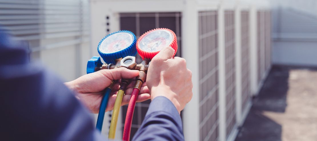 A guy measuring Cooling Capacity of AC