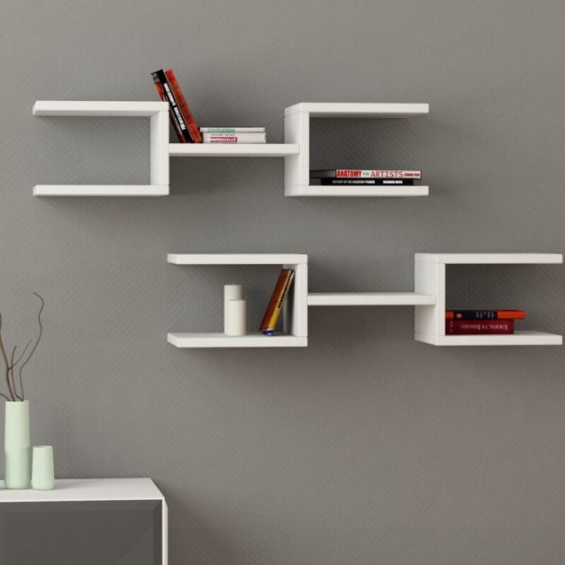 Books arranged on a Wall-Mounted Shelves