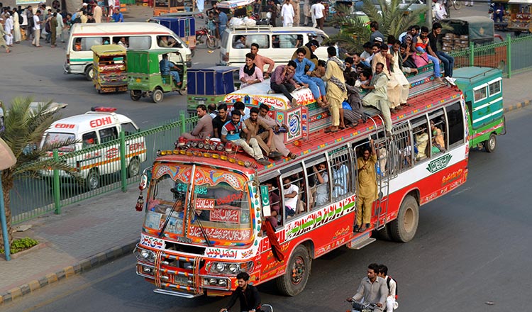 a bus carrying passengers