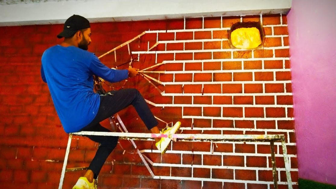 A painter applying 3D Brick Wall paint