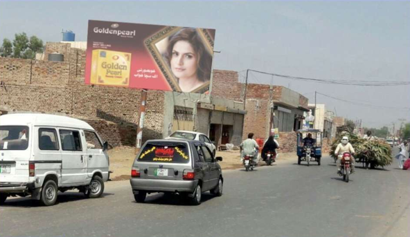 Vehicles travelling on the road in Kamalia