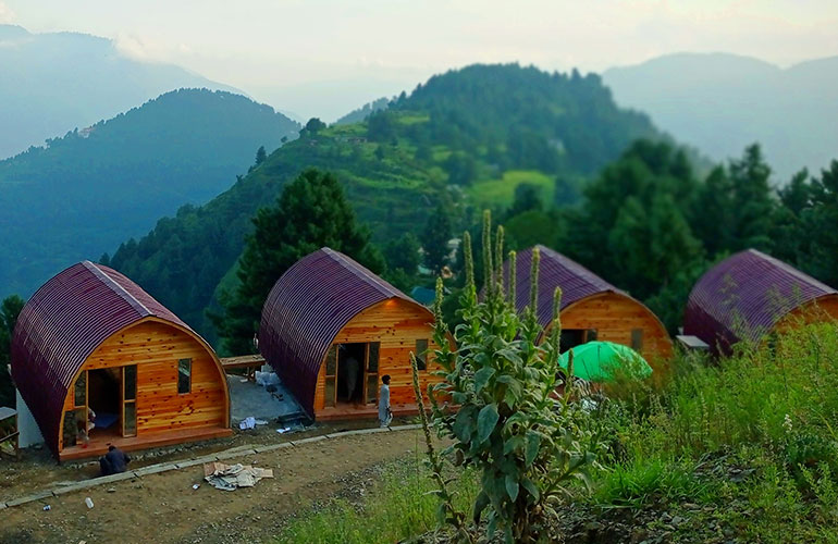 wooden pods at sharan forest