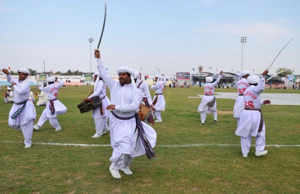 Balochi people celebrating and dancing in Sibi Mela