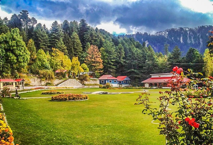 Green valley of Mansehra covered in clouds