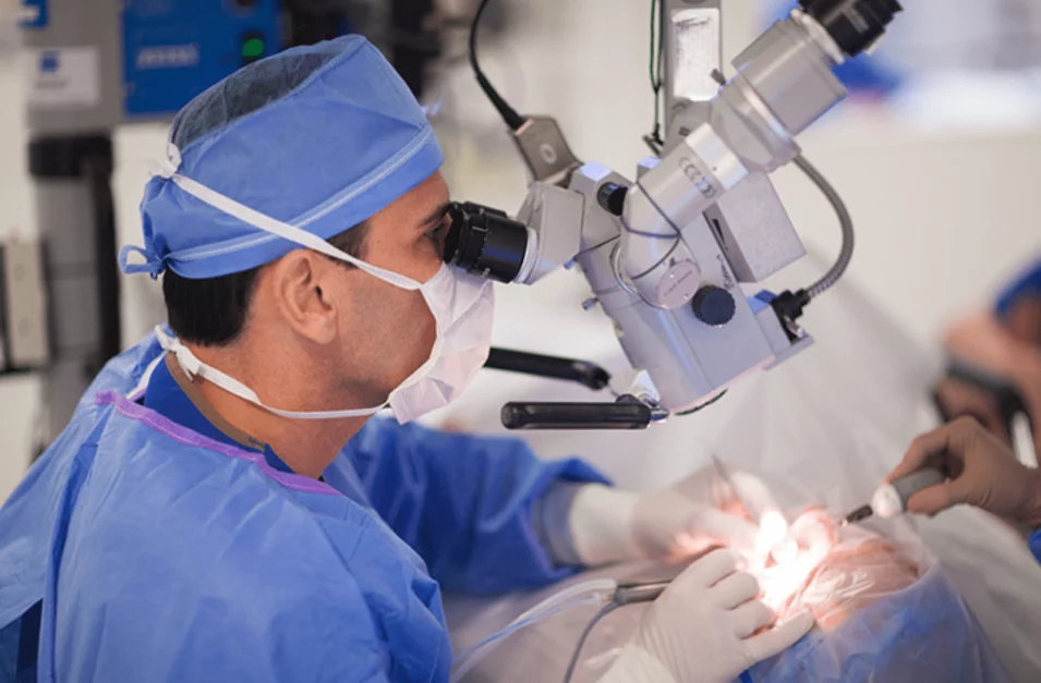 surgeons perform cataract surgery