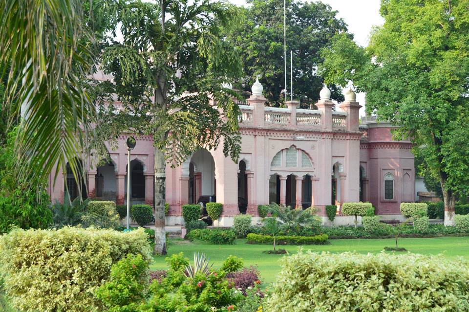 Chamba house surrounded by green lawns