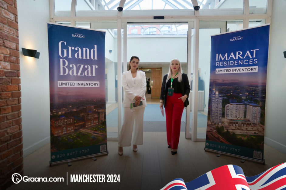 two women posing for a picture at Manchester event